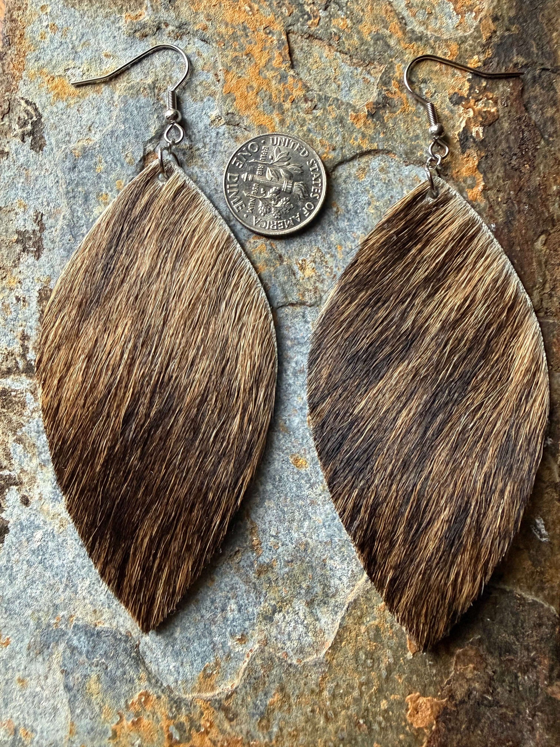 Cowhide Large Leaf Earrings showcasing hair-on cowhide in bold tones with large leaf design.