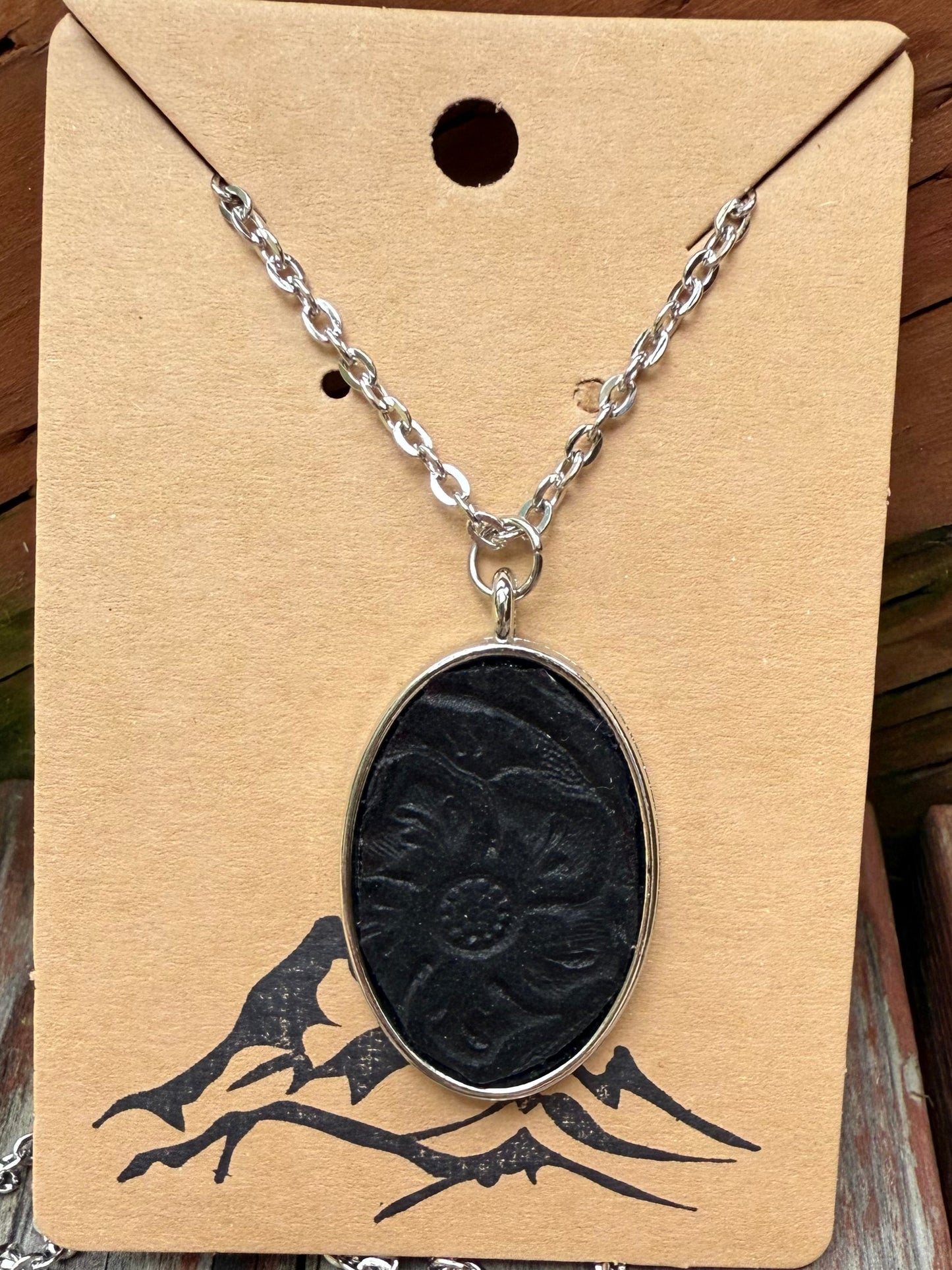 Black Embossed Leather Oval Pendant Necklace