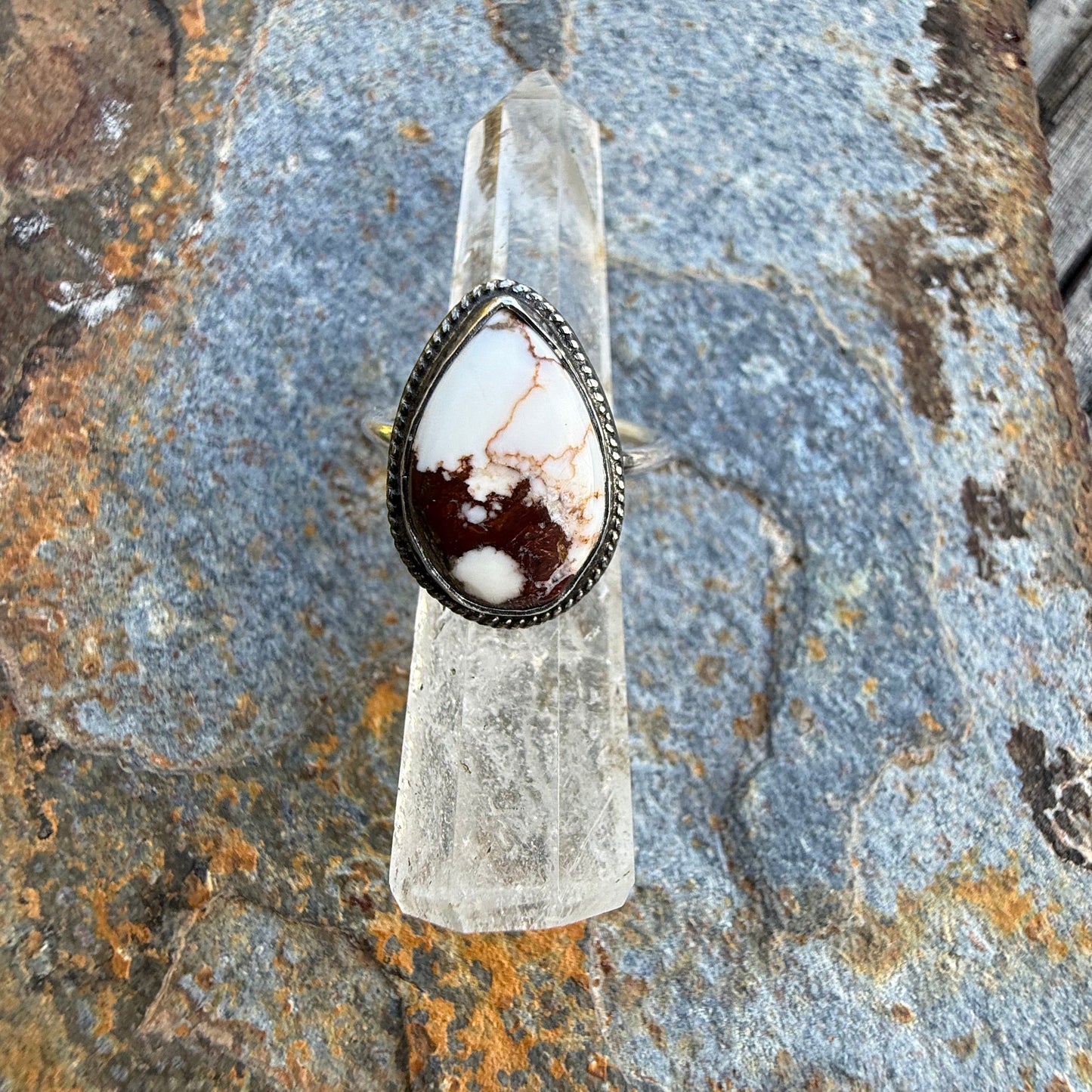 white and brown stone on stone surface